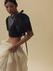 Vania Romoff Camisa Top Black made with silk organza and has Butterfly sleeves and a self-tie back ribbon 