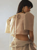 Vania Romoff Camisa Top Nude made with silk organza and has Butterfly sleeves and a self-tie back ribbon 