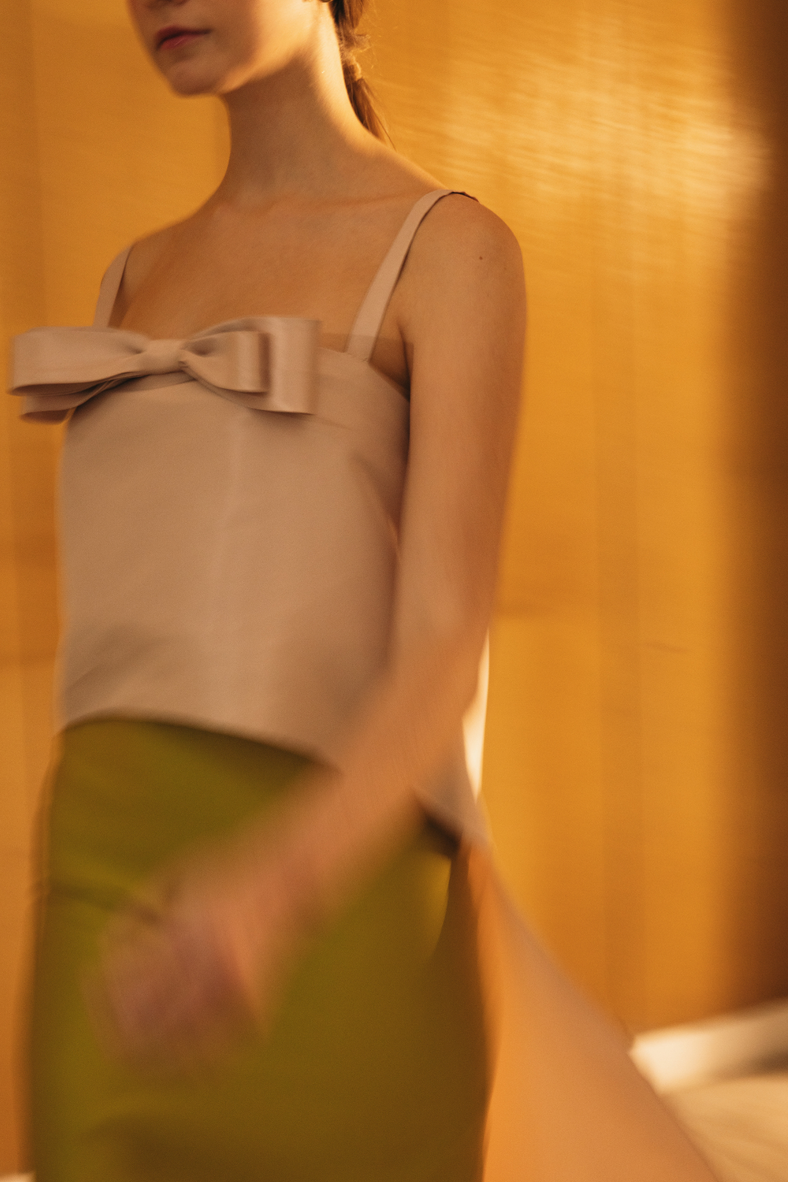 Vania Romoff The Nancy Top in blush is crafted in crisp taffeta and features a high–low hem
