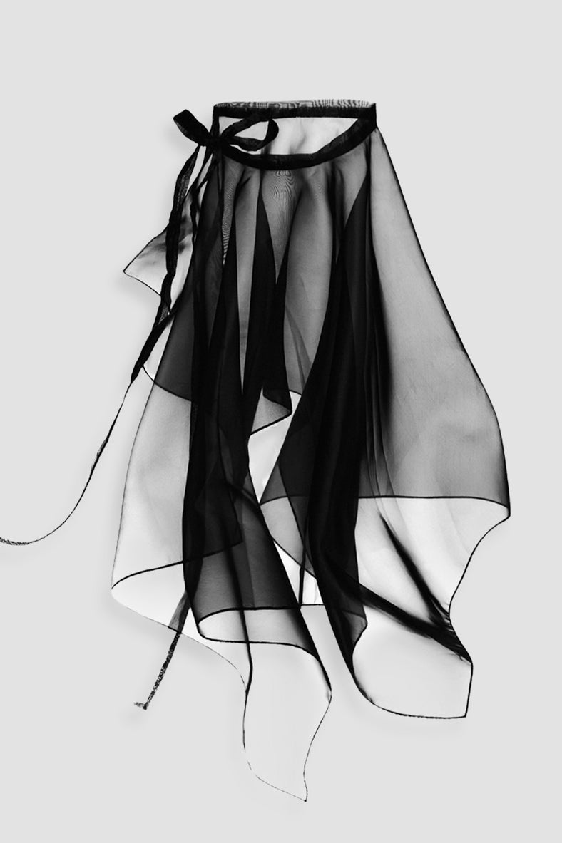 Vania Romoff Peplum Wrap Nude made with sheer organza and ties at the waist