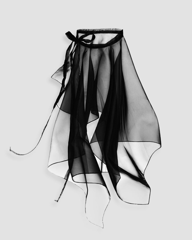 Vania Romoff Peplum Wrap Nude made with sheer organza and ties at the waist