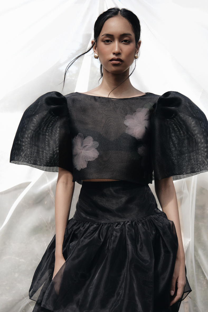 Vania Romoff The Camisa Top with floral appliqué in black is made with light and airy french gauze fabric and has delicate floral appliqué