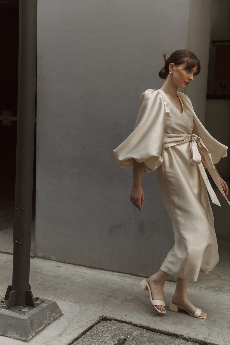 Vania Romoff Sylvie Dress in light gold wrap style dress with voluminous bishop sleeves