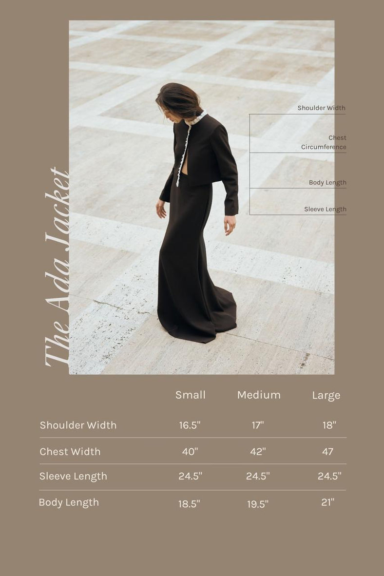 Vania Romoff The Ada Jacket in black and white features a structured silhouette in black neocrepe. Contrasting white trim frames the neckline measurements