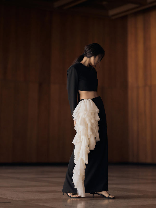 Vania Romoff The Alma Skirt in black and white  features a sleek, floor-length silhouette in black neocrepe