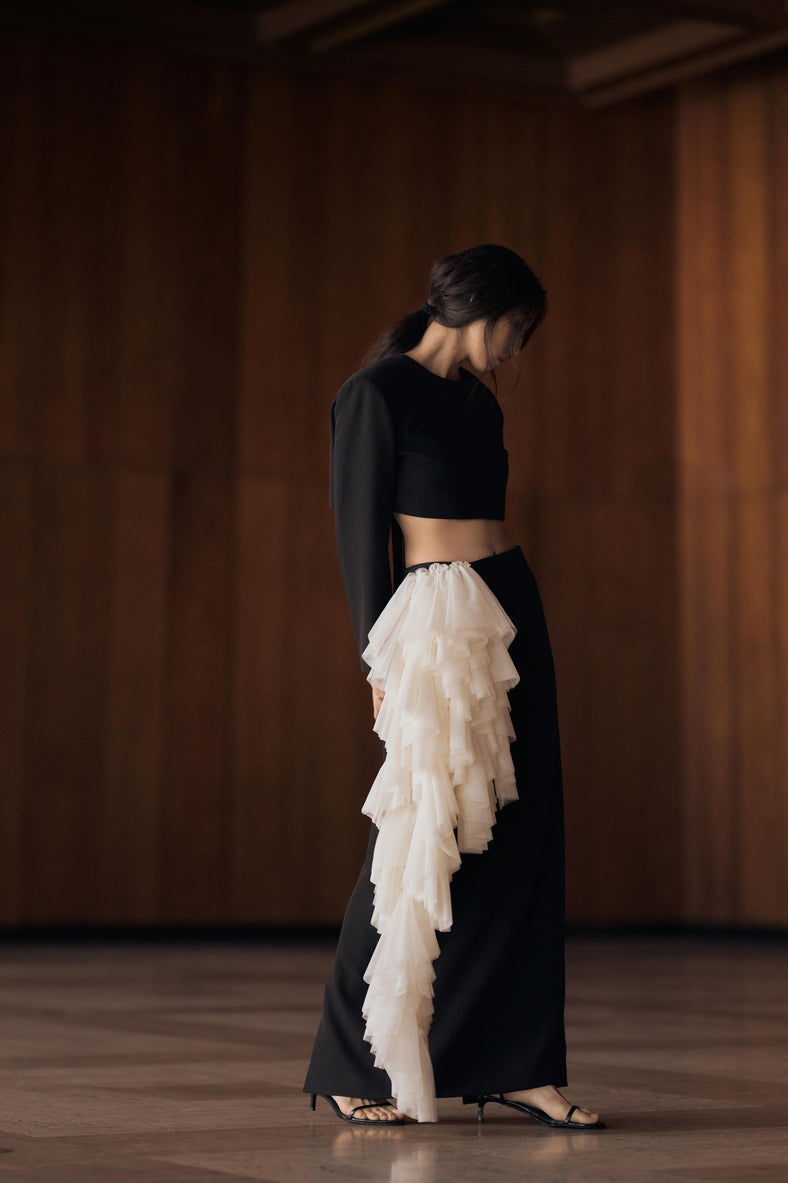 Vania Romoff The Alma Skirt in black and white  features a sleek, floor-length silhouette in black neocrepe