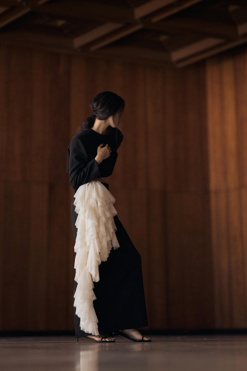 Vania Romoff The Alma Skirt in black and white  features a sleek, floor-length silhouette in black neocrepe