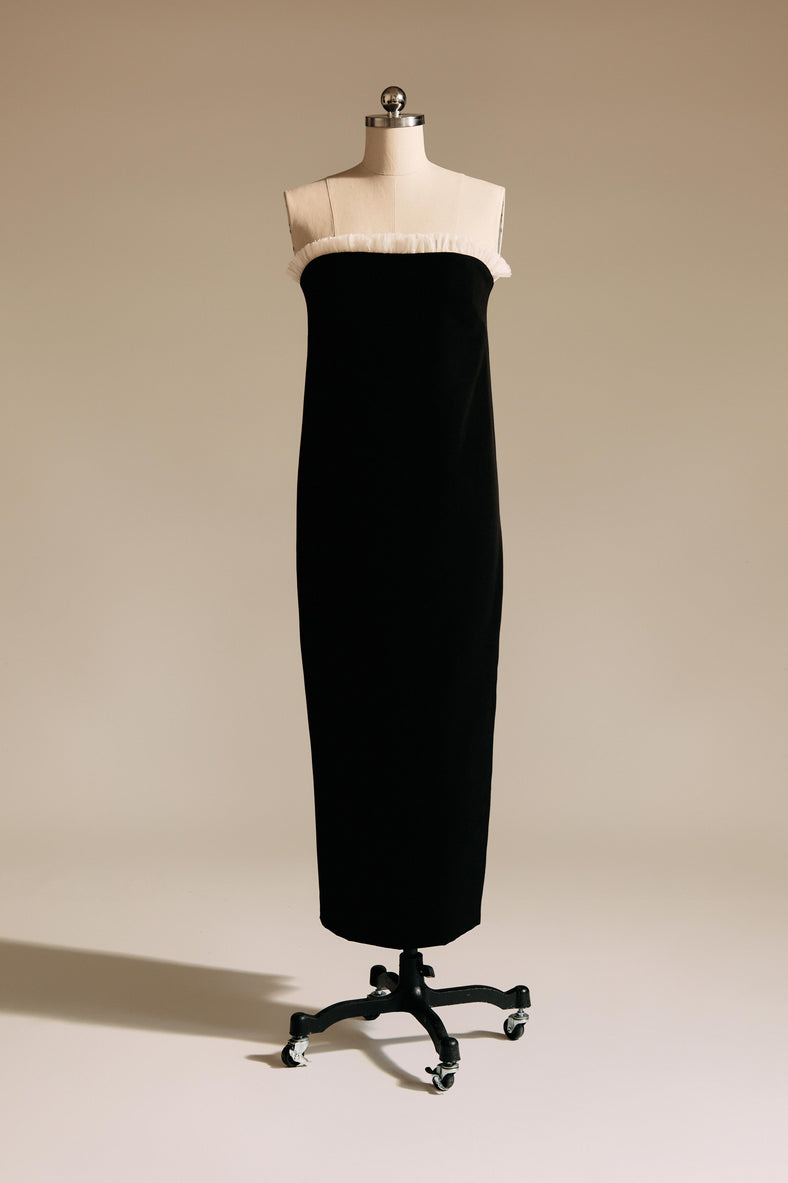 Vania Romoff The Helene Dress  in black features a sleek, strapless silhouette in black neocrepe, with a contrasting ivory trim along the neckline