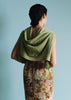 Vania Romoff Lucy Cardigan in Pistachio crafted from soft wool with ribbon detail at the back