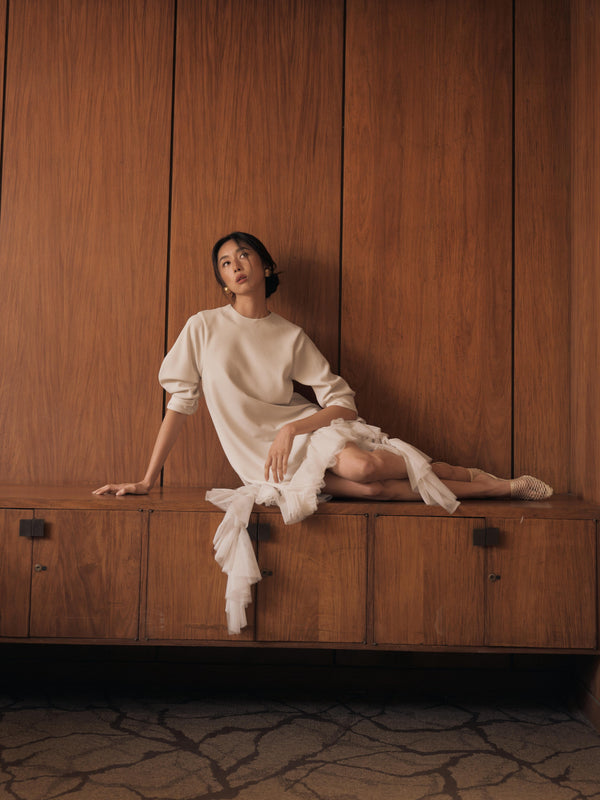 Vania Romoff The Ophelia Dress in ivory  features a relaxed silhouette in ivory stretch crepe, with softly gathered sleeves and cascading ruffles 