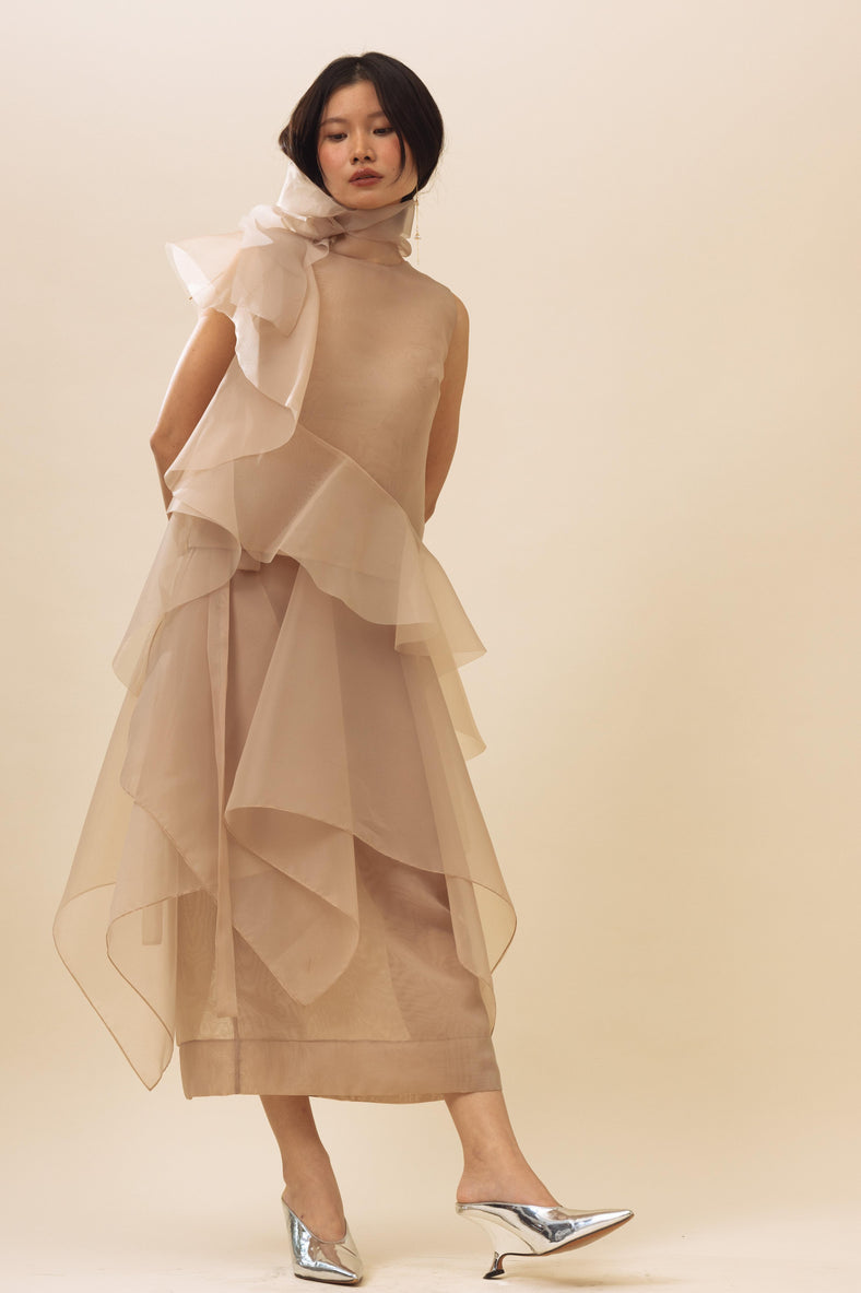 Vania Romoff Peplum Wrap Nude made with sheer organza and ties at the waist