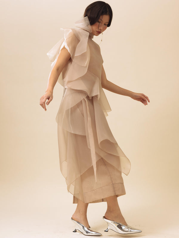 Vania Romoff Peplum Wrap Nude made with sheer organza and ties at the waist