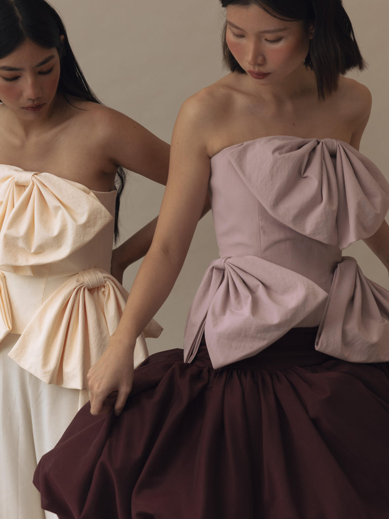 Vania Romoff Simone Top Pink made in taffeta and shaped by hand-sewn statement bows