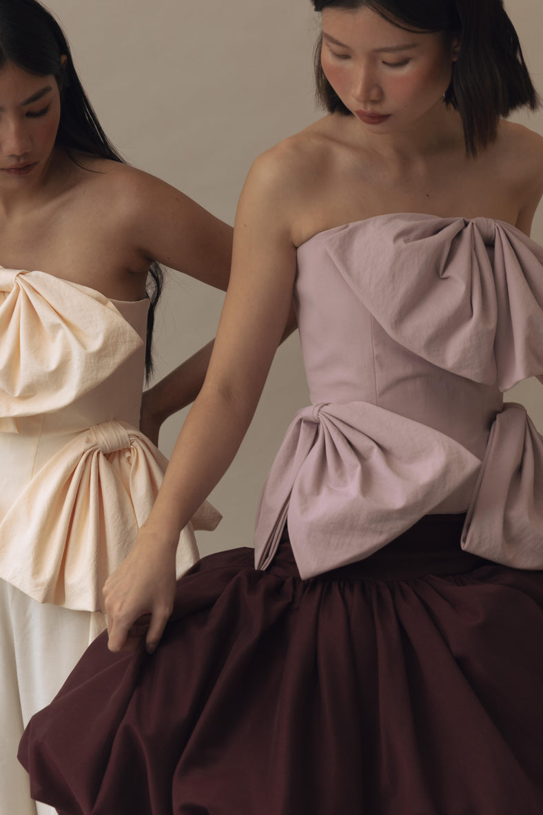 Vania Romoff Simone Top Pink made in taffeta and shaped by hand-sewn statement bows