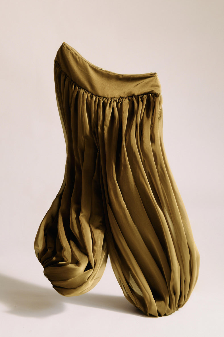 Vania Romoff The Sybil Pants in Amber Green feature a voluminous silhouette in lightweight khaki chiffon